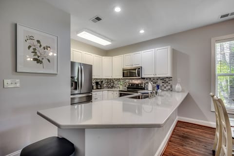 Plenty of counter space, stainless appliances, and a great layout for entertaining or just sipping coffee.