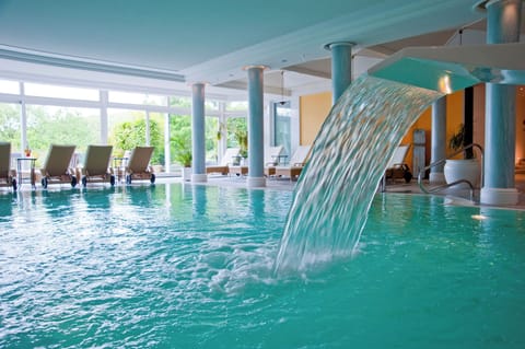 Indoor pool, outdoor pool, open 7:00 AM to 7:00 PM, sun loungers