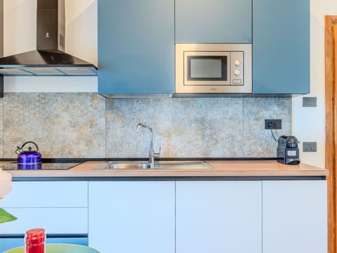 Kitchen, Countertop, Interior Design, Cabinetry, Wood, Flooring, Kitchen Appliance, Furniture, Major Appliance, Plumbing Fixture