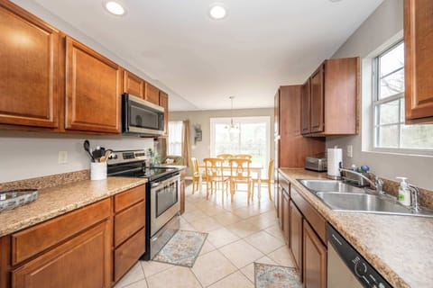 The inviting kitchen offers ample space & every home comfort