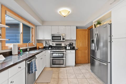 Your gourmet kitchen features stainless steel appliances, granite countertops, and everything you need for memorable home-cooked meals.