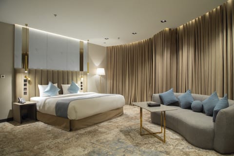 Suite, 2 Bedrooms | In-room safe, laptop workspace, blackout drapes, iron/ironing board