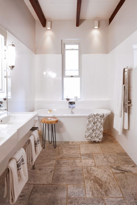 Stable Suite | Bathroom | Designer toiletries, hair dryer, bathrobes, slippers