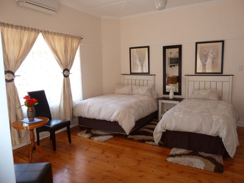 Family Room | Premium bedding, in-room safe, iron/ironing board, free WiFi
