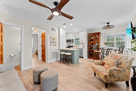 Enjoy a bright and inviting space for dining, relaxing, or planning your next beach day with family and friends.