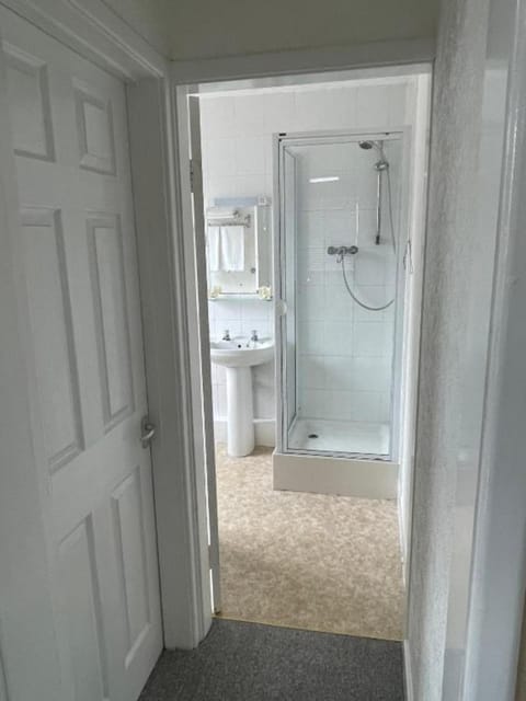 Shower, free toiletries, towels, toilet paper