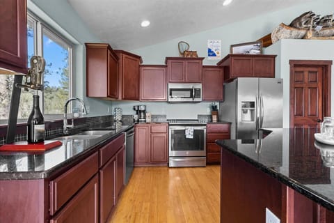 Cook, dine, and connect in our open-concept kitchen.