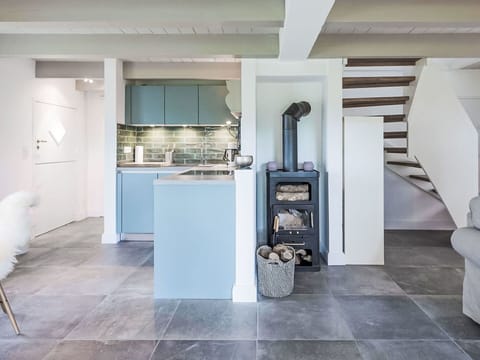 Flooring, Interior Design, Furniture, Floor, Wood, Ceiling, Kitchen, Countertop, Cabinetry, Room