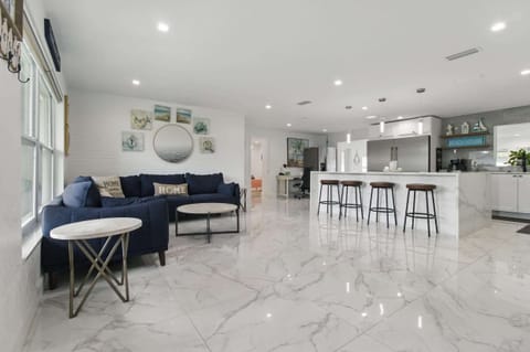 Enjoy the comfort of an open-concept living space that flows seamlessly into the kitchen—perfect for spending time together while cooking, dining, or relaxing.