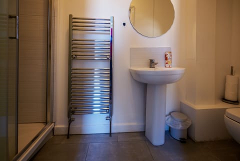 Shower, towels, toilet paper