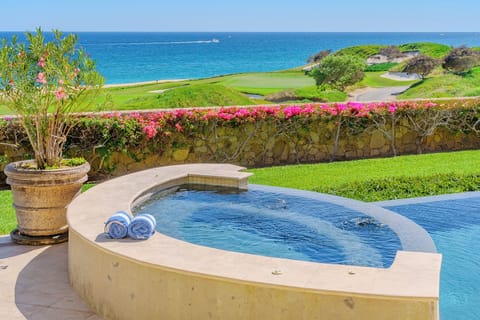 Poolside with incredible ocean and golf course views