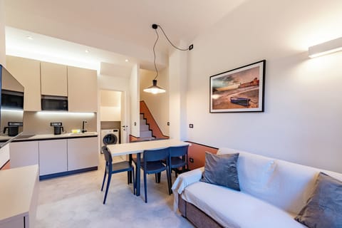 Apartment, City View | Living area | 43-inch flat-screen TV with digital channels, TV