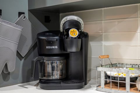 Coffee Delight: Savor every sip brewed by our convenient coffee maker.