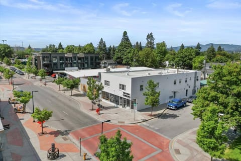 Perched above a neighborhood coffee shop in Midtown CDA—your artsy home base with everything just steps away.