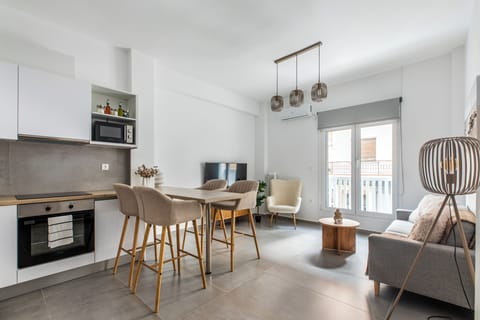 Basic Apartment, 2 Bedrooms, Kitchen, City View | Living area | 55-inch Smart TV with cable channels, streaming services