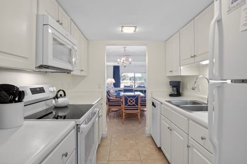 Full kitchen with all mainstay appliances and fully stocked cookware.