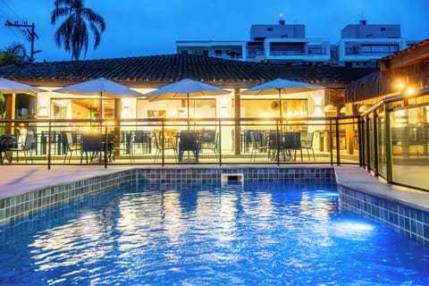 Outdoor pool, open 10:00 AM to 10:00 PM, pool umbrellas, sun loungers