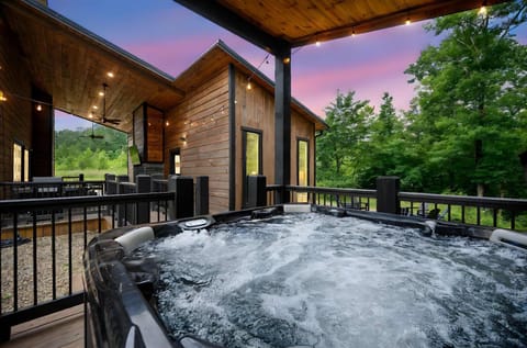 Cabin, Multiple Beds, Hot Tub, Garden View (Bearly Creekin') | Outdoor spa tub