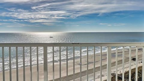 Oceanfront balcony perfect for sunrise coffee overlooking the waves