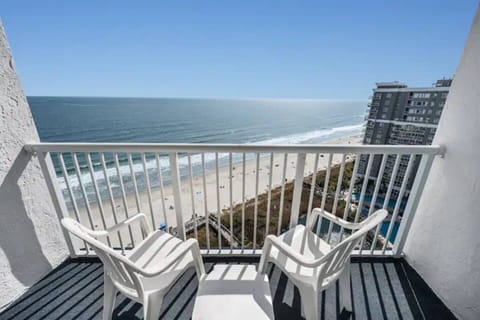 Wake up to wide ocean views from this bright seaside room