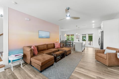 Spacious living room with a sectional and smart TV