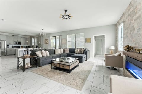 Stupendous and gorgeous family gathering, perfect blend of modern style with a Electric Fireplace emphasize comfort, functionality and practicality. The modern decoration has a sense of sophistication and elegance.