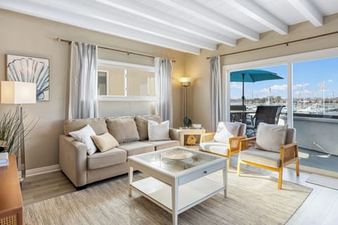 Bright and airy living space with stunning waterfront views.