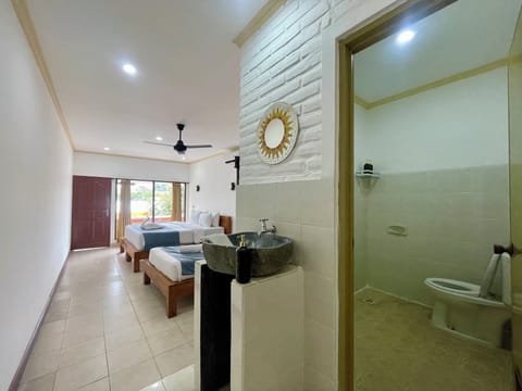 Deluxe Triple Room, Balcony | Free WiFi