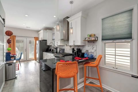 Our kitchen counter includes stylish bar seating for two, perfect for casual meals or morning coffee chats.