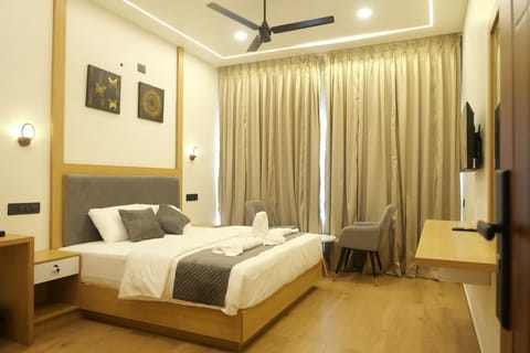 Premium Double Room, Valley View | Desk, laptop workspace, blackout drapes, iron/ironing board