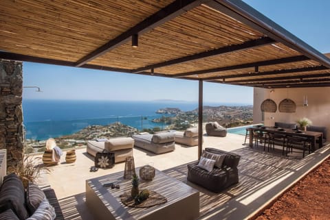 Elegant and serene, Villa Ouranos offers a calming retreat with soft, sunlit interiors and panoramic views of the Cretan Sea.