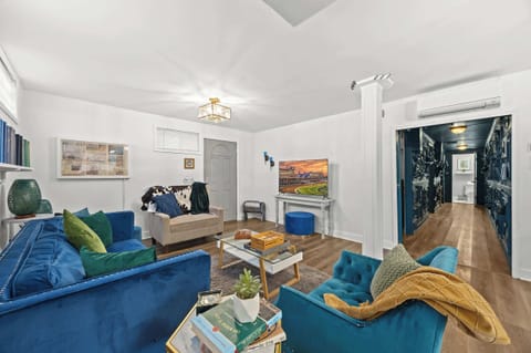 Living Room: Unit 8 - Bright and inviting living space, perfect for relaxing and connecting.