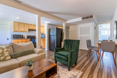 Bright, cozy living space with plush seating — perfect for movie nights or relaxing.