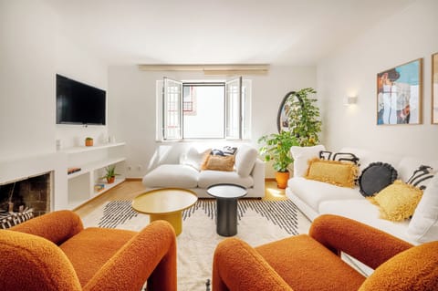 Apartment, Beachside | Living area | Flat-screen TV