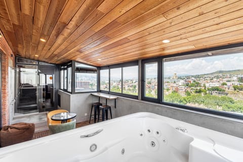 Deluxe Room, Hot Tub, River View | Private spa tub