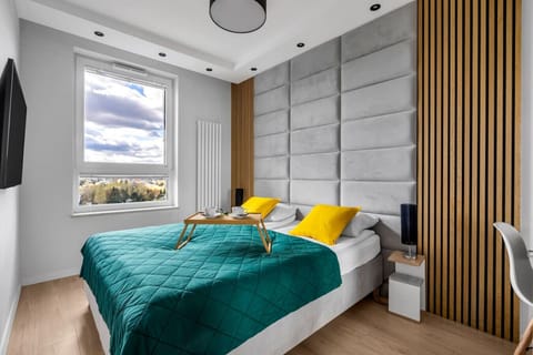Main Bedroom - Big Smart-TV for Your Entertainment | Book Now with RENTUJEMY.COM