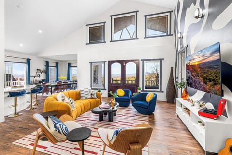 Bask in the picturesque views, custom mural artwork, and uniquely designed decor