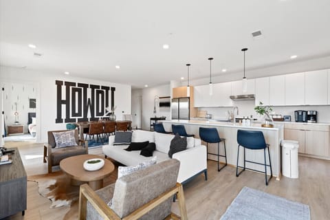 Seamlessly connected kitchen, dining, and living areas – perfect for socializing