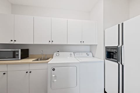 Laundry room with washer and dryer on the 1st floor