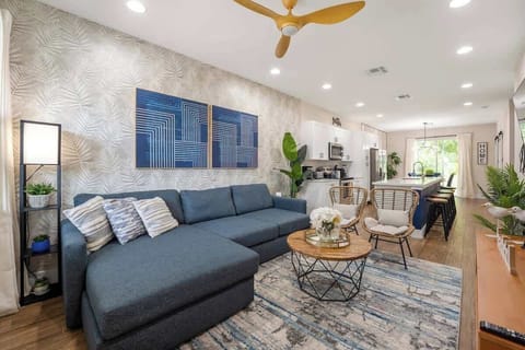 This beautiful house offers mid-century decor & open-concept living room to accommodate comfortably your entire family.