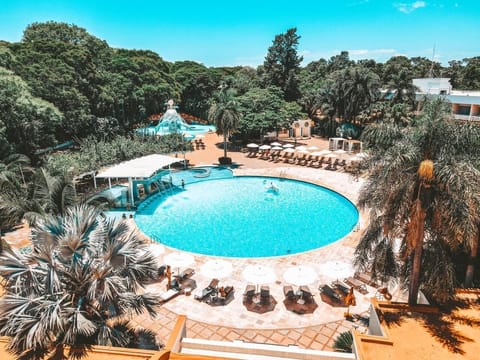 Indoor pool, outdoor pool, pool umbrellas, sun loungers