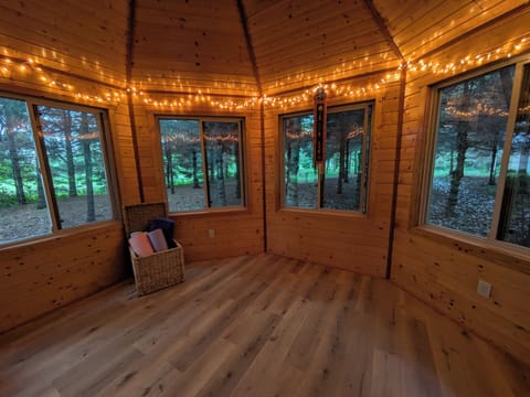 Enjoy some yoga in the gazebo in the woods! Or, it's a fun hideout for the kids.
