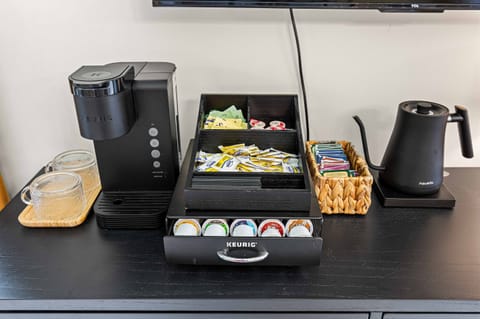 Enjoy a morning pick-me-up without leaving your room—this convenient in-suite coffee station is stocked with pods, teas, and all the essentials.” ☕🌿✨
