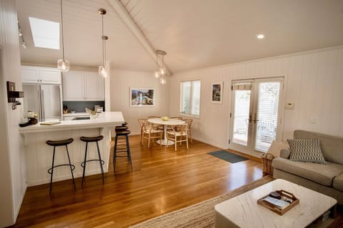 This open-concept living and dining area is designed for effortless vacation living.