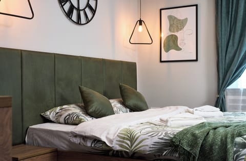 Laptop workspace, blackout drapes, soundproofing, iron/ironing board