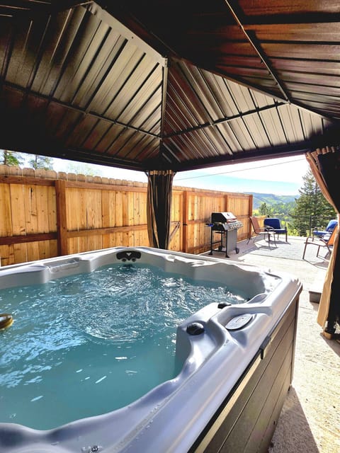 Grba a soak in the spa on the private patio w/ amazing views