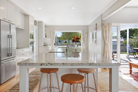 There is bar seats at the kitchen island which are great for casual dining.