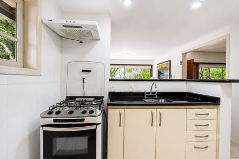 Villa | Private kitchen | Fridge, microwave, oven, stovetop