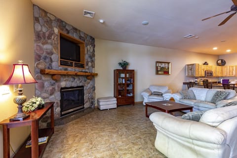 The Great Room Entertainment lounge, TV and Fireplace