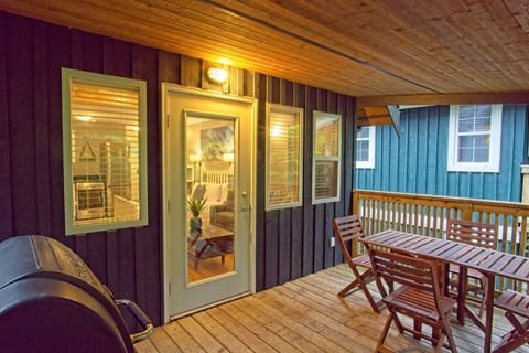 Covered outdoor deck with dining and BBQ